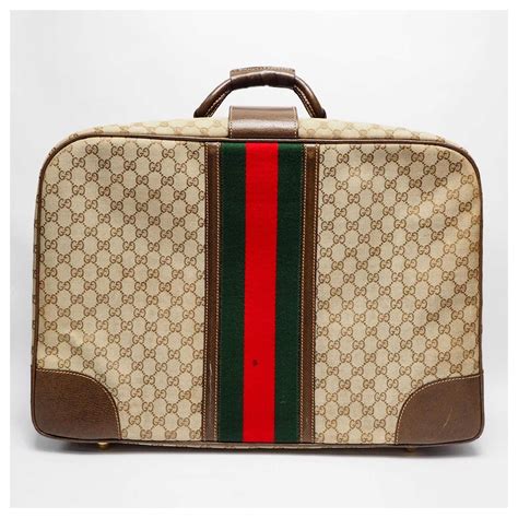 Bagages et accessoires de voyage Gucci pour femme .